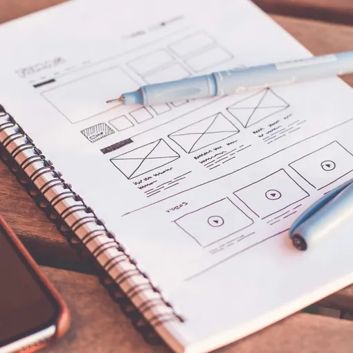 Squarespace Website Design in Progress Close up of a computer screen showing Squarespace website design layouts